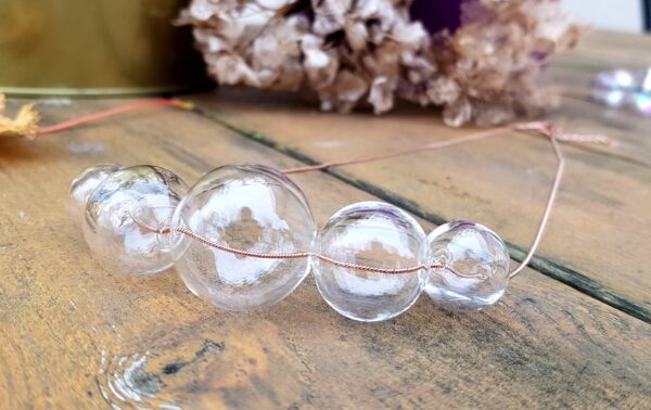 Clear glass bubbles on rosé gold snake chain necklace and earrings set - Image 4